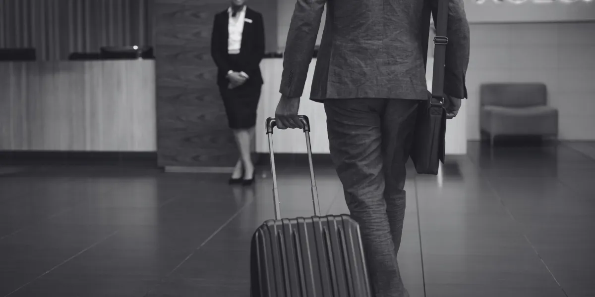 A man traveling with a suitecase