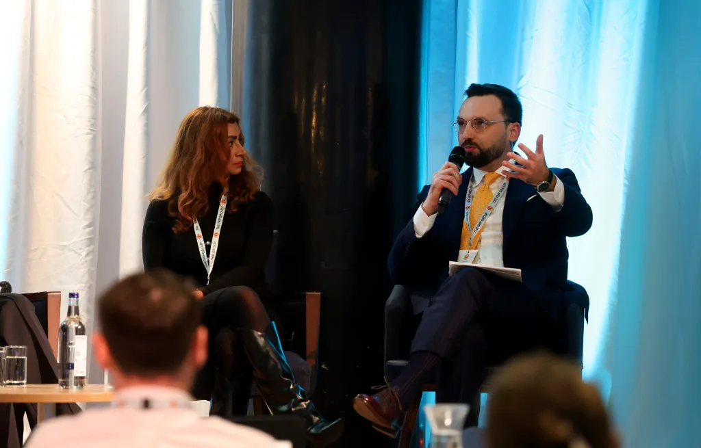 Rafal Hyps speaks at the TRM conference