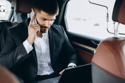 an executive travelling in a car