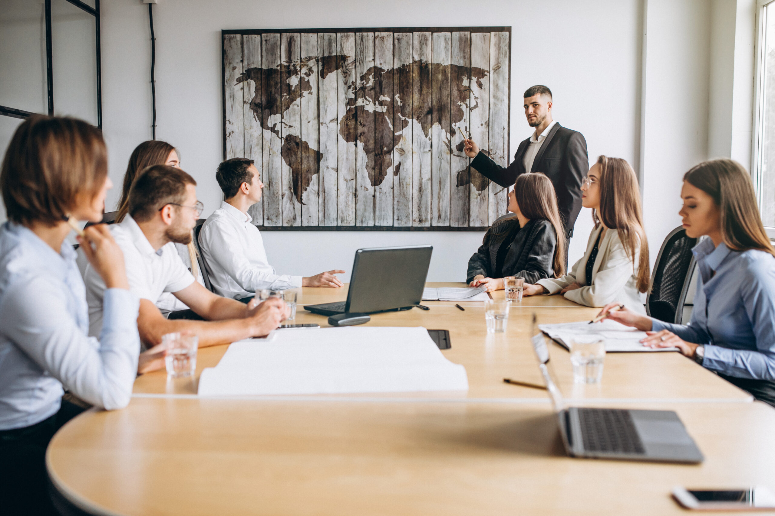 Team planning international employee travel with risk and duty of care considerations