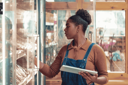 A woman managing a retail store in Africa