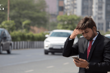 A frustrated business man receiving a distressing evacuation notice on their phone