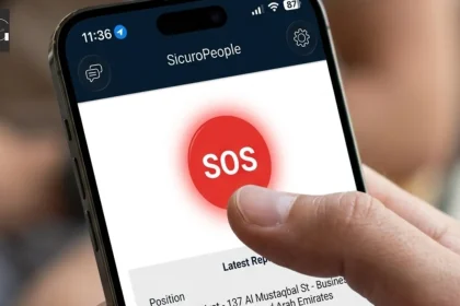 Close-up of the SicuroPeople mobile app with a user pressing the SOS emergency button for instant safety alerts and emergency assistance.